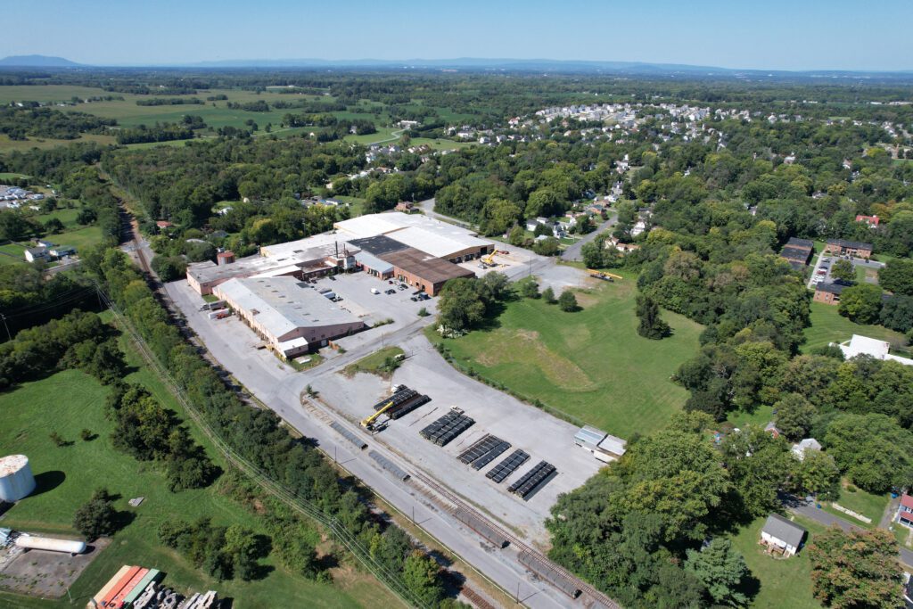 Aerial view of the industrial building at 351 Station Road, Berryville, VA, listed by Serafin Real Estate.