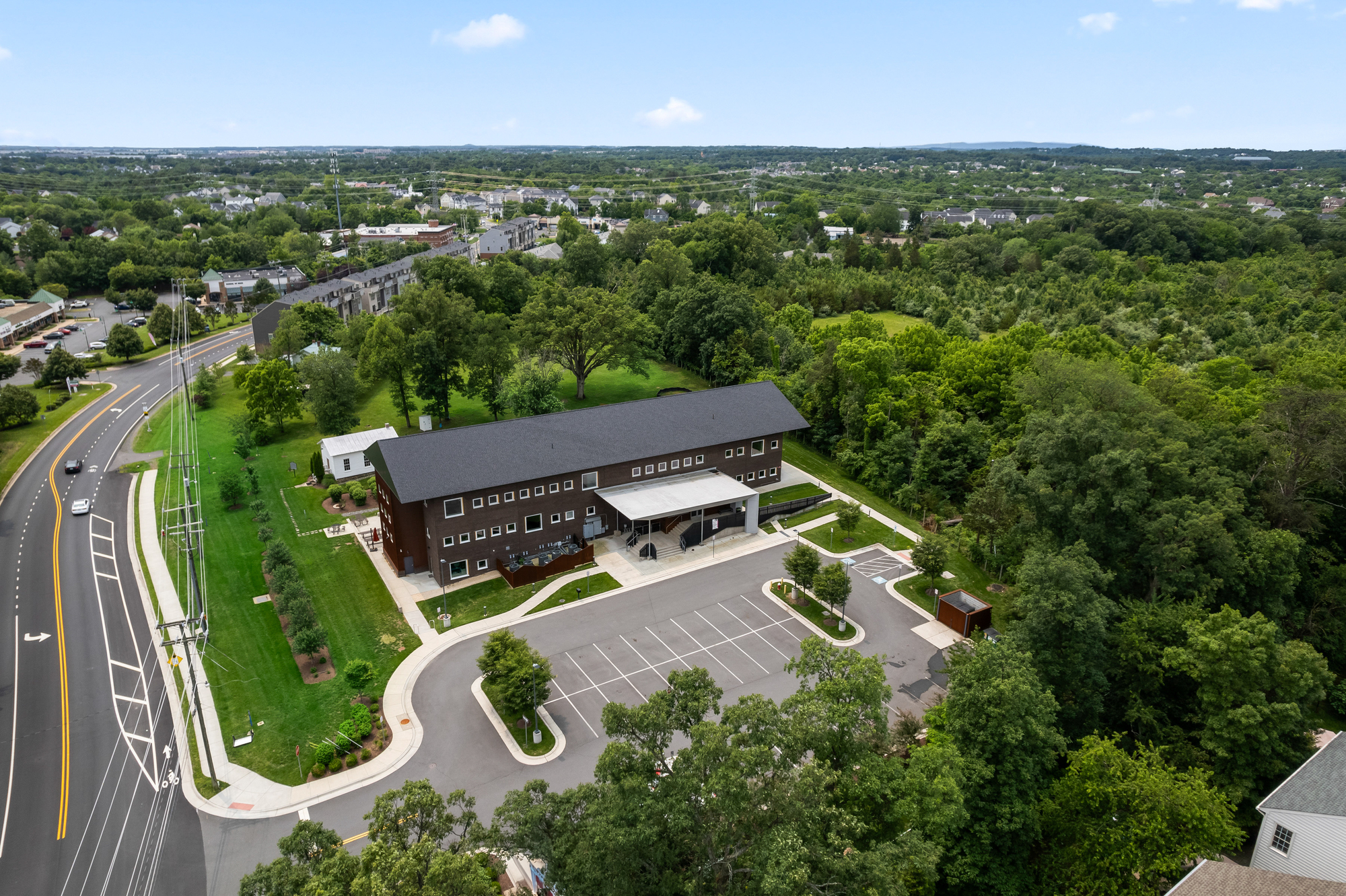 Aerial view of the award-winning private school campus at 20577 Ashburn Road, successfully leased by Serafin Real Estate in Ashburn, VA