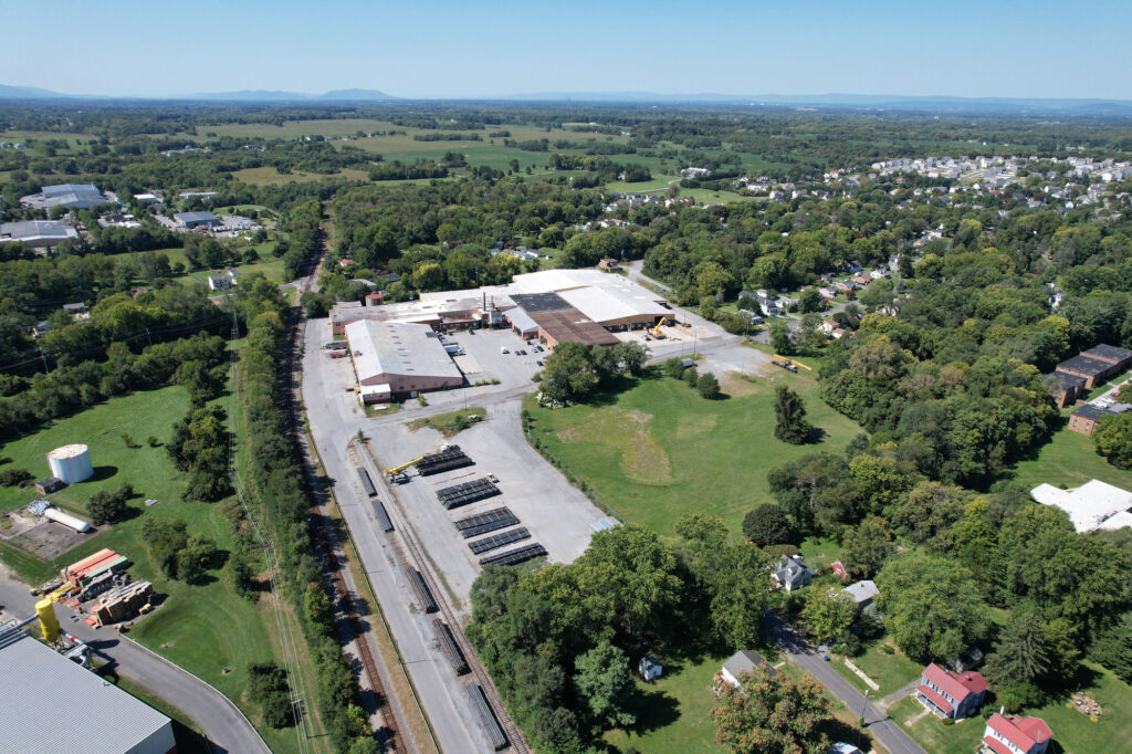 Aerial drone view of 351 Station Road, a 270,000 SF industrial warehouse in Berryville, VA, sold by Serafin Real Estate for $14M.