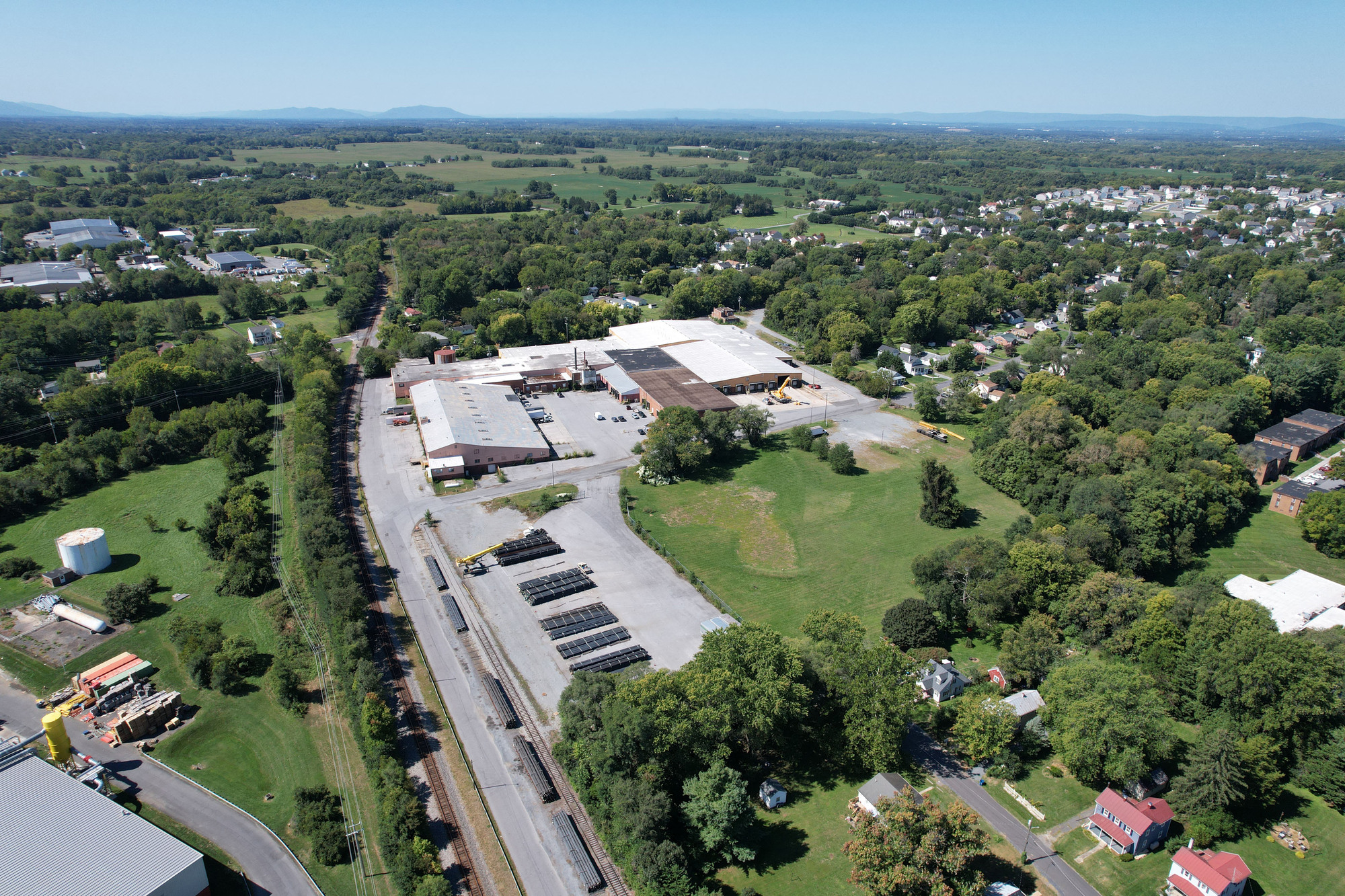 Aerial drone view of 351 Station Road, a 270,000 SF industrial warehouse in Berryville, VA, sold by Serafin Real Estate for $14M.